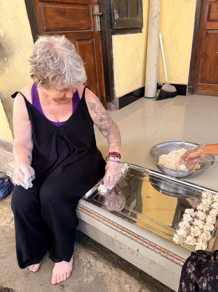 Nakedjen helping with taro chips